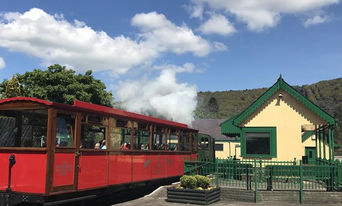 Steam train departing Llanberis Station